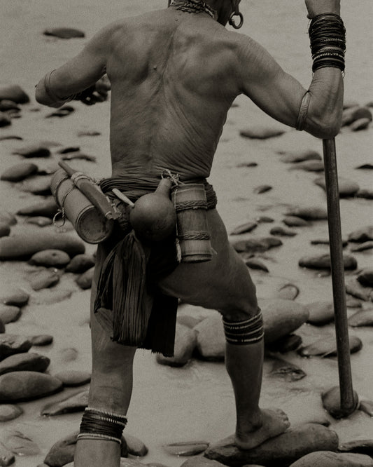 Penan Hunter Walking in River, Borneo