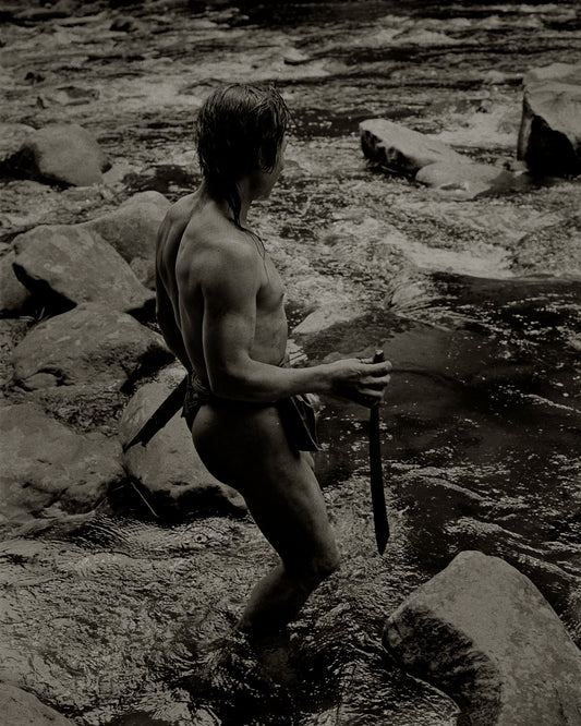 Penan Hunter Brandishing his Parang Jimpul